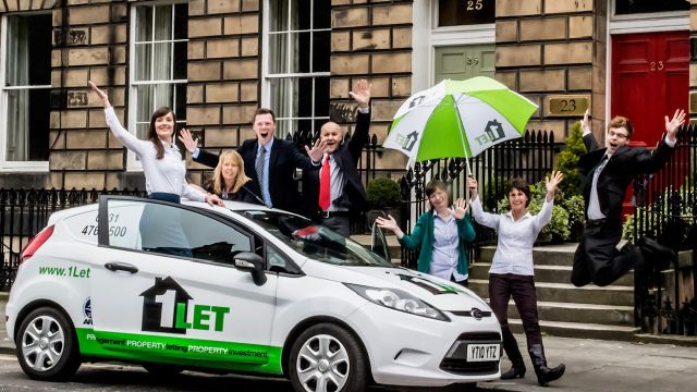 Katharine and the team enjoying the new car livery!