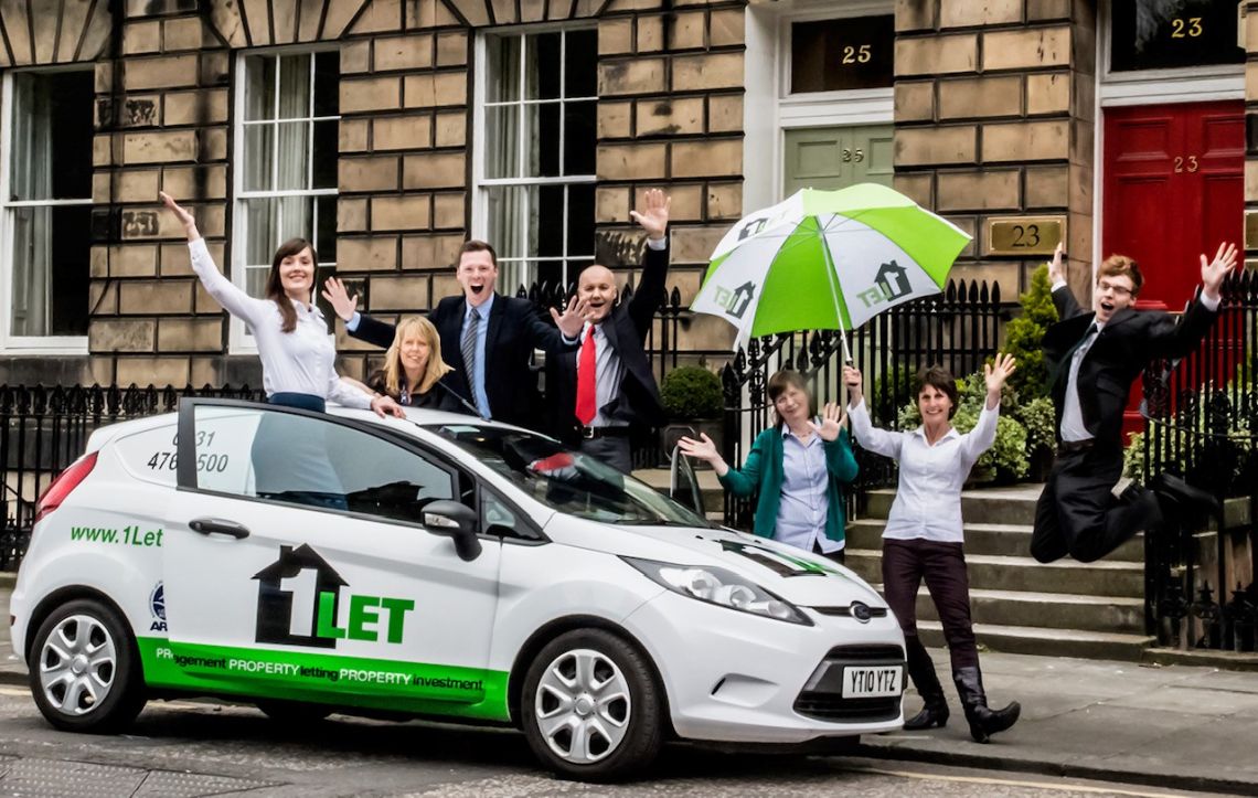 Katharine and the team enjoying the new car livery!